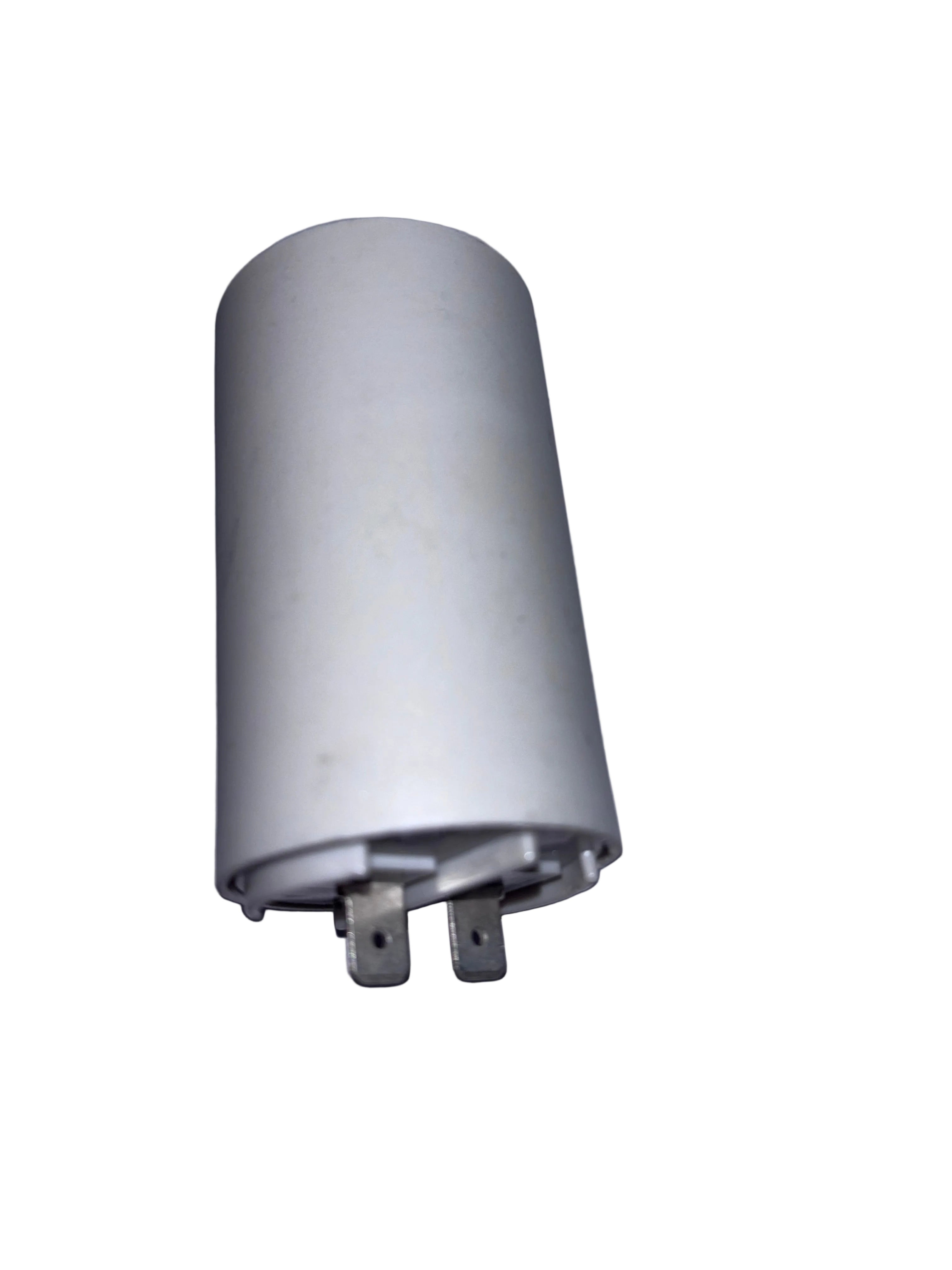 Cylindrical component with metallic end on a light purple background
